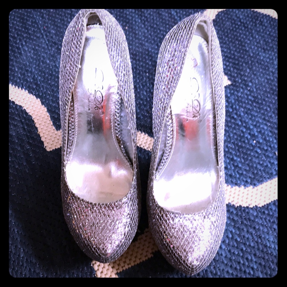 silver high heels.